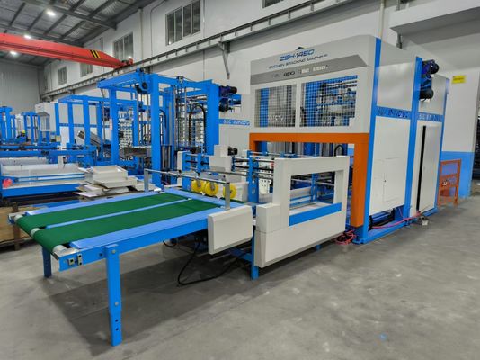 Sistem stacking dan flute laminating dengan mesin stacker otomatis untuk produksi kardus bergelombang